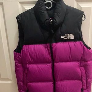 The North Face puffer vest in Magenta pink